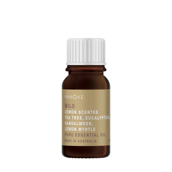 10mls Essential oil bottle named Wild with lemon scented tea tree, eucalyptus, sandalwood and lemon myrtle with a white cap on a Transparent background