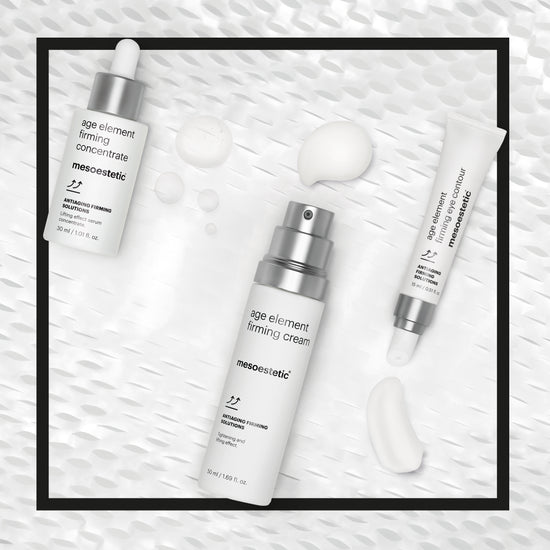 Skincare products with 'mesoestetic' branding on a textured white background