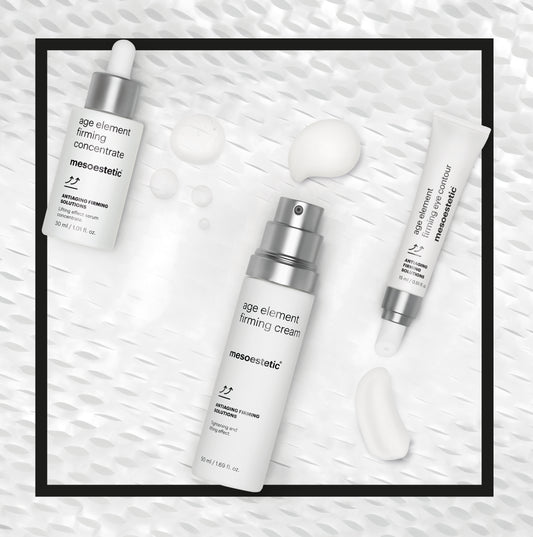 Skincare products with 'mesoestetic' branding on a textured white background