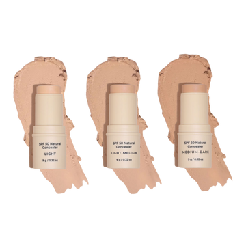 Three SPF 50 Natural Concealer sticks with swatches