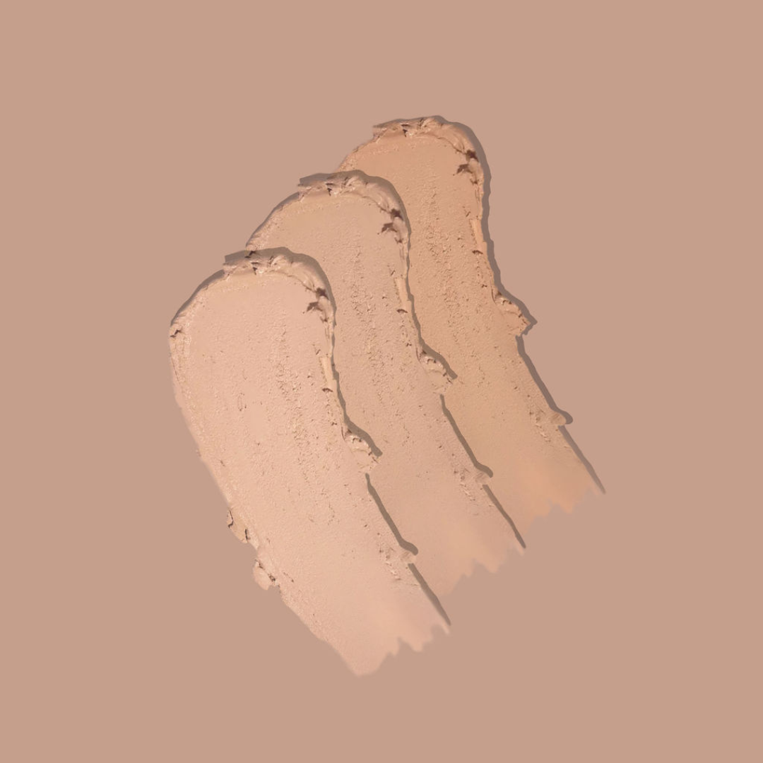 Three swatches of beige avo zinc on a beige background