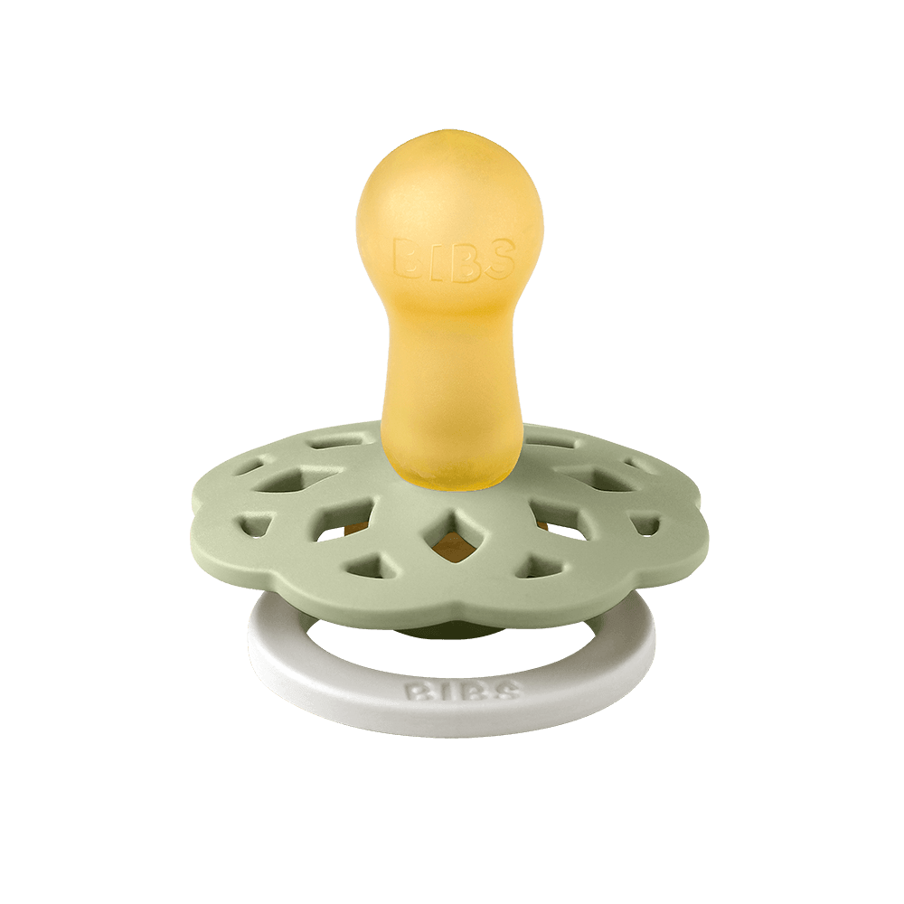 BIBS Boheme pacifier featuring sage color, flower-style silicone shield, and white ring handle—premium baby soothers for newborns and infants. Glow in the dark, round, size one.