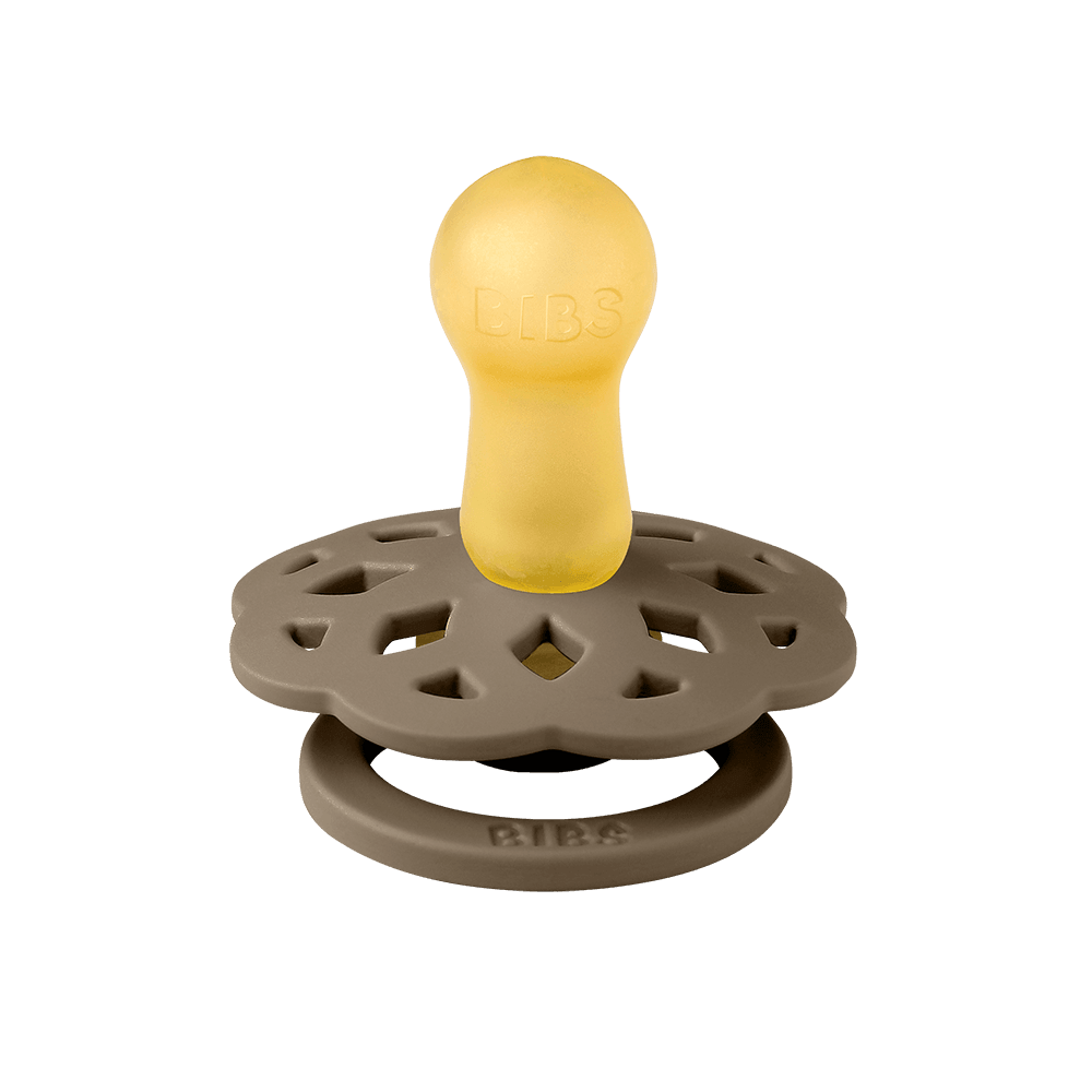 BIBS Boheme pacifier featuring woodchuck colour, flower-style silicone shield, ring handles—premium baby soothers for newborns and infants. Round, size one.
