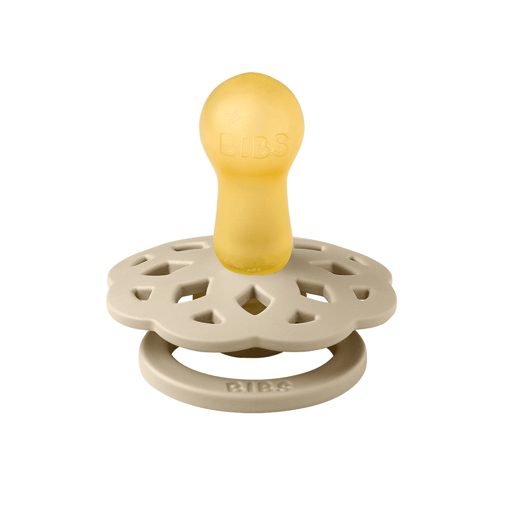 BIBS Boheme pacifiers featuring vanilla colour, flower-style silicone shield, ring handles—premium baby soothers for newborns and infants. Round, size one.