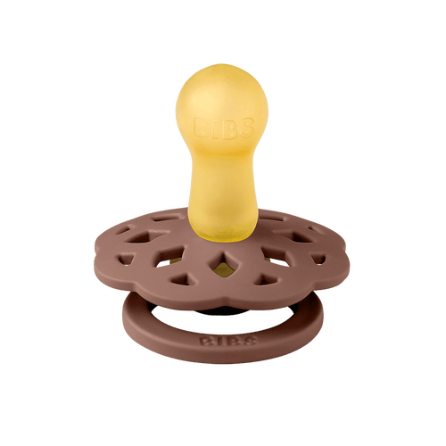 BIBS Boheme pacifiers featuring blush and woodchuck color, flower-style silicone shield, ring handles—premium baby soothers for newborns and infants. Round, size one.
