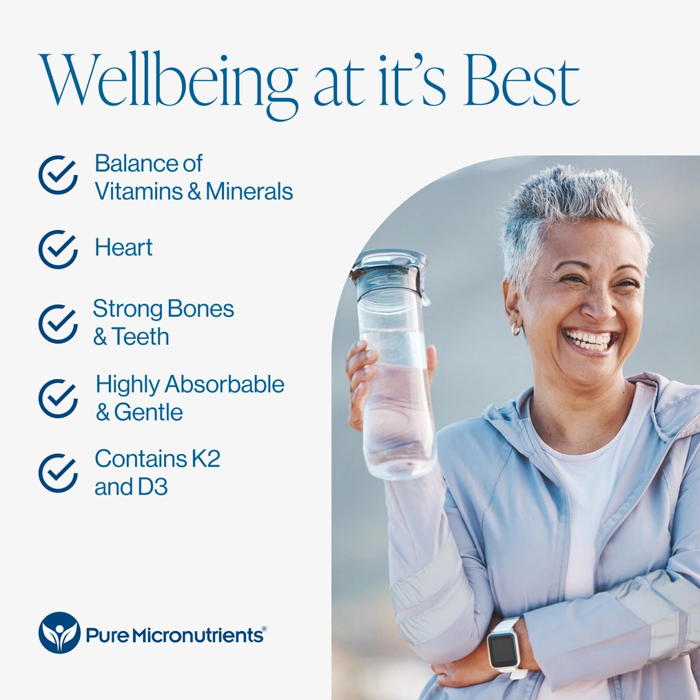 Woman holding a water bottle with text about balance of vitamins & minerals, heart, strong bones & teeth, highly absorbable & gentle, contains K2 and D3 , featuring Pure Micronutrients branding.