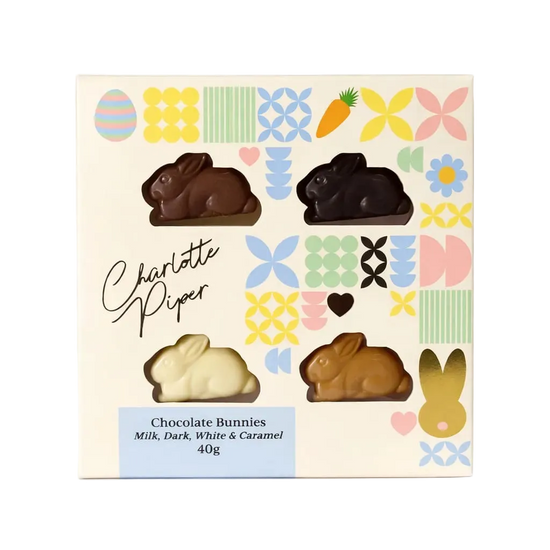 Box of Charlotte Piper chocolate bunnies with colorful patterned box