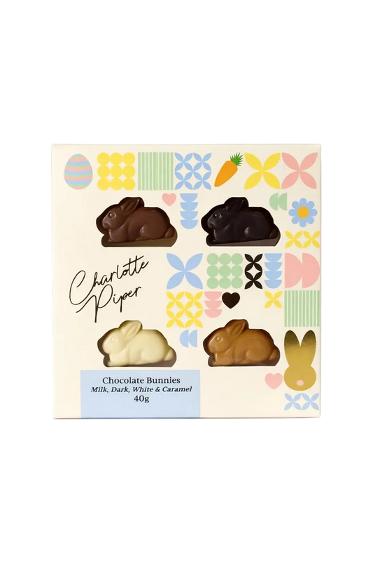 Box of Charlotte Piper chocolate bunnies with colorful patterned box