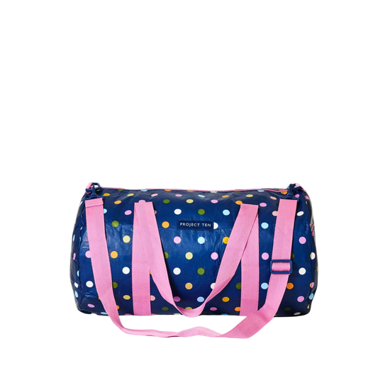 Polka dot duffel bag with pink straps