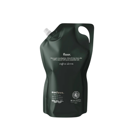 Green plastic bottle labeled 'floor' with euclove branding
