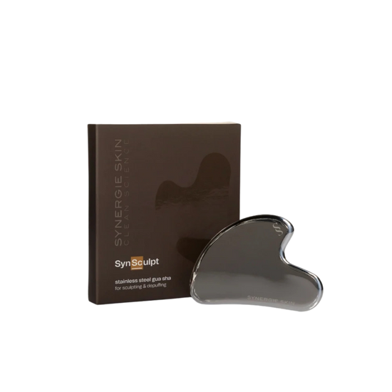 Gua Sha tool and brown box it comes in