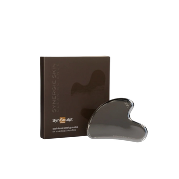 Gua Sha tool and brown box it comes in
