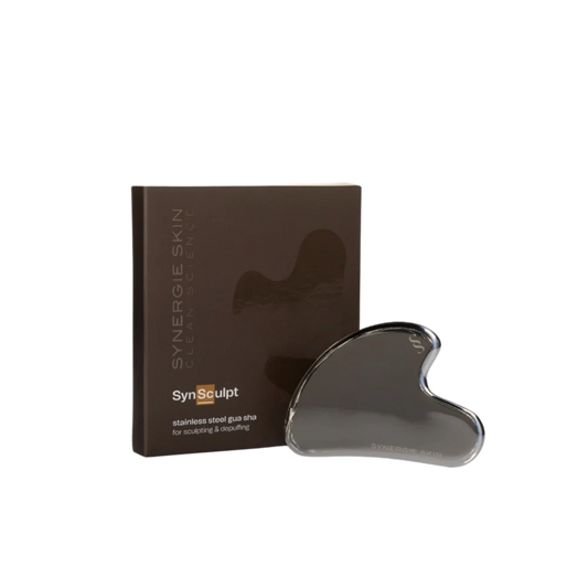 Gua Sha tool and brown box it comes in
