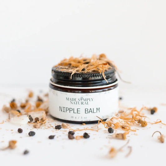 Nipple balm made simply natural jar with dried herbs on a white background