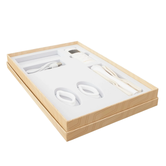 Set of white electronic devices in a cardboard box for led mask