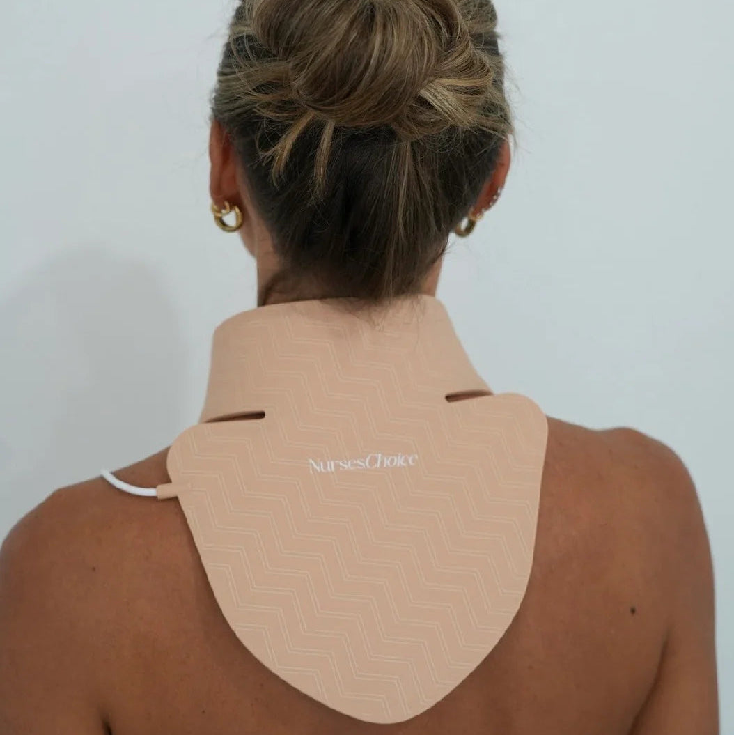Person wearing a beige neck led mask with 'nurses choice' branding on a plain background