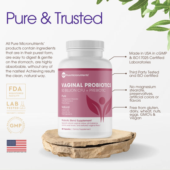 Vaginal probiotics supplement bottle with branding and product details on a stone stand.