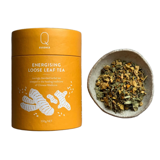 Energising loose leaf tea canister 100g . Little bowl of loose tea.
