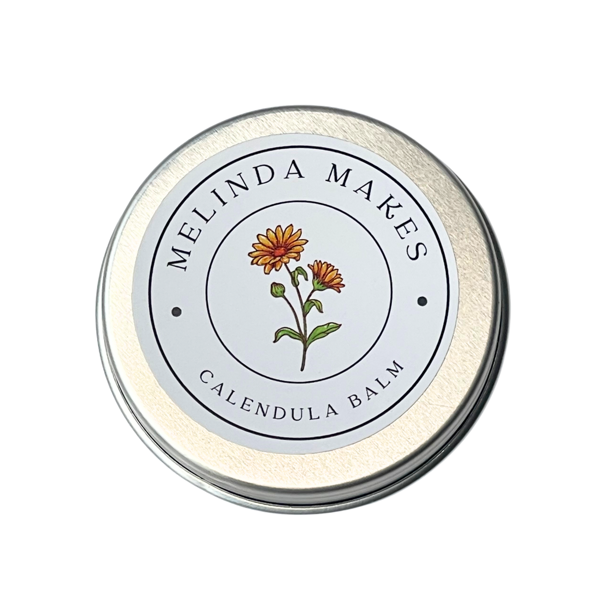 Tin of Melinda Makes Calendula Balm with calendula floral on it