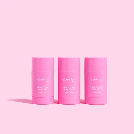 Three amoris pink hair styling products with 'Amoris' branding on a pink background